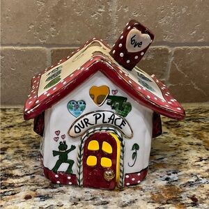 Charming Holiday Ceramic House with Red Accents